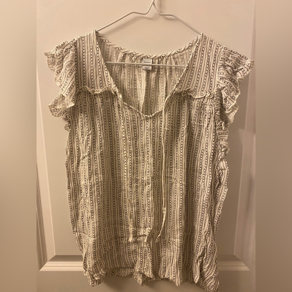 White and black sleeveless top